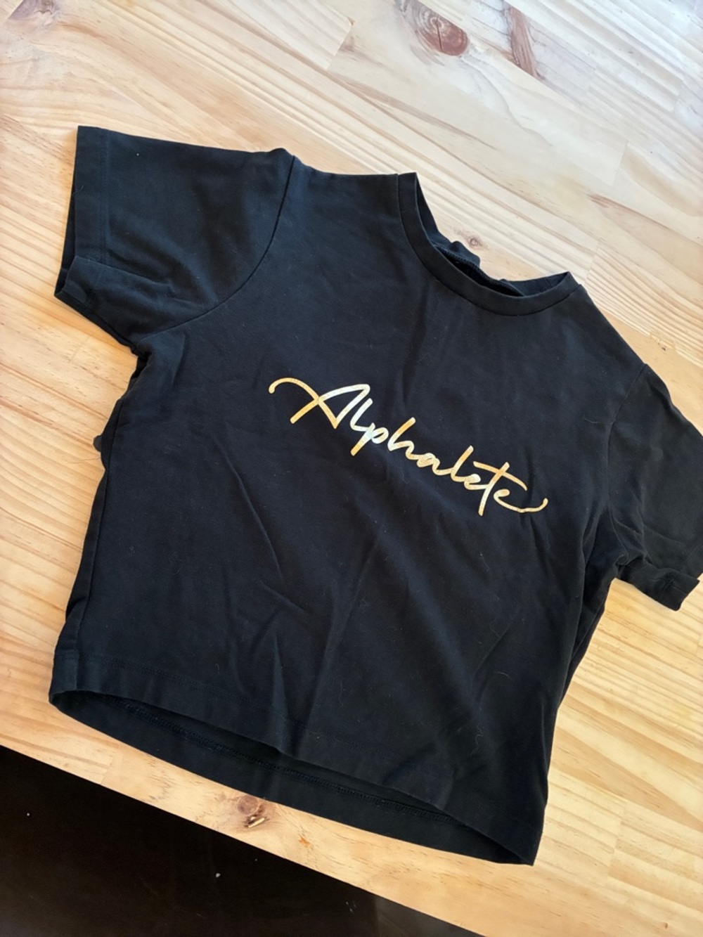 Alphalete Black Tee with Gold Script
